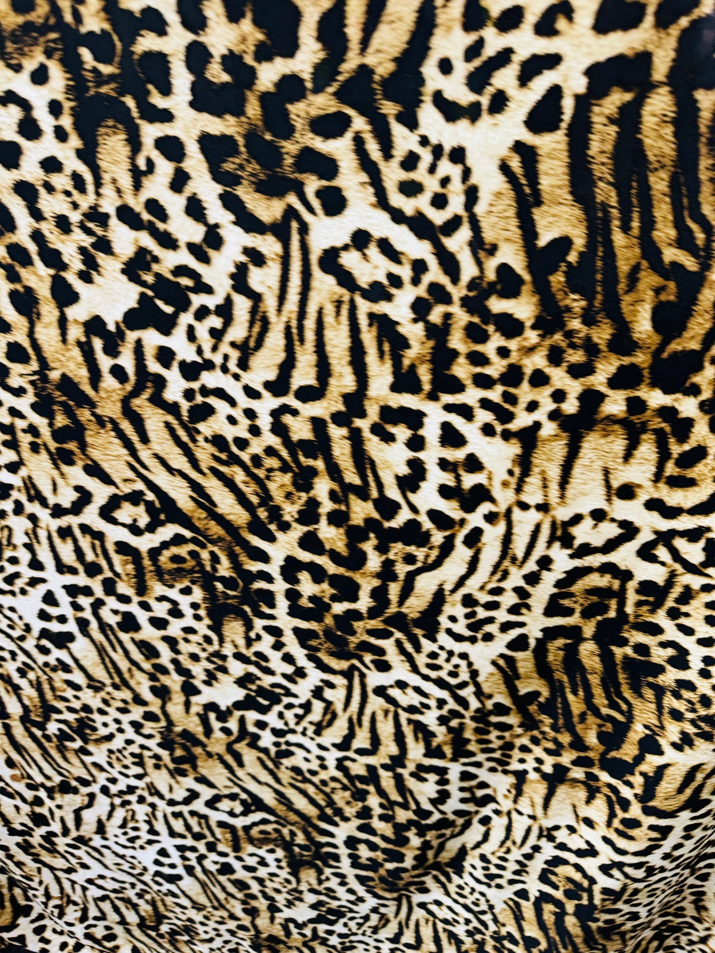 Wild Leopard design print on poly spandex medium weight 4-way stretch 58/60”
