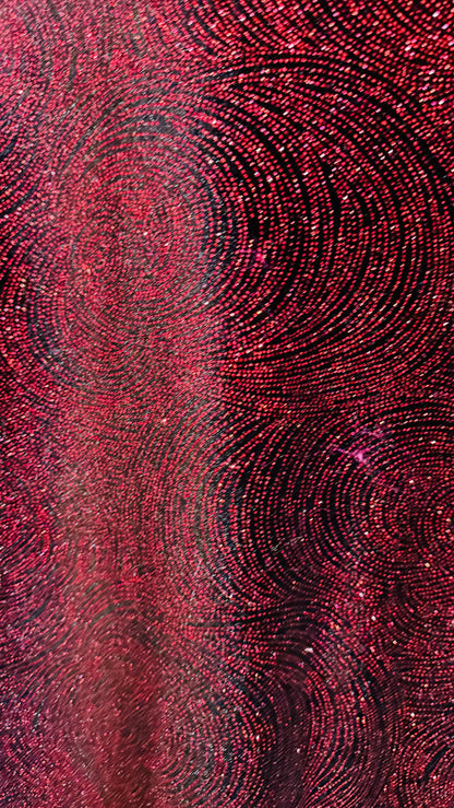 Swirl design on stretch velvet with glitter black/red 4-way stretch 58/60”