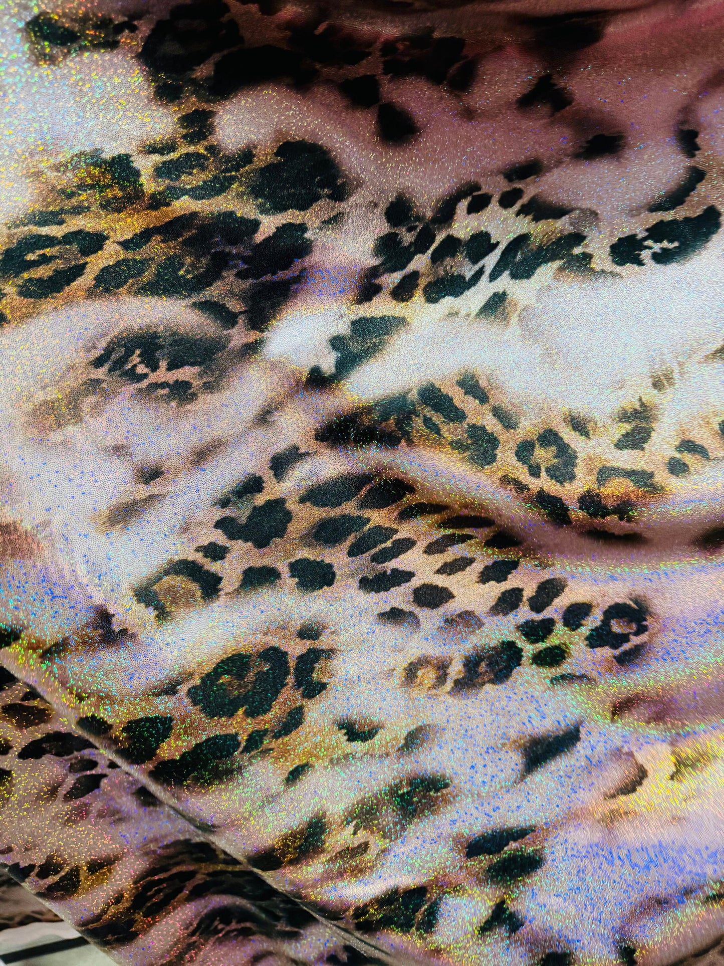 New Hiding Leopard design on metallic nylon spandex with hologram foil 4-way stretch 58/60” High quality fabrics by AlexLAFabrics
