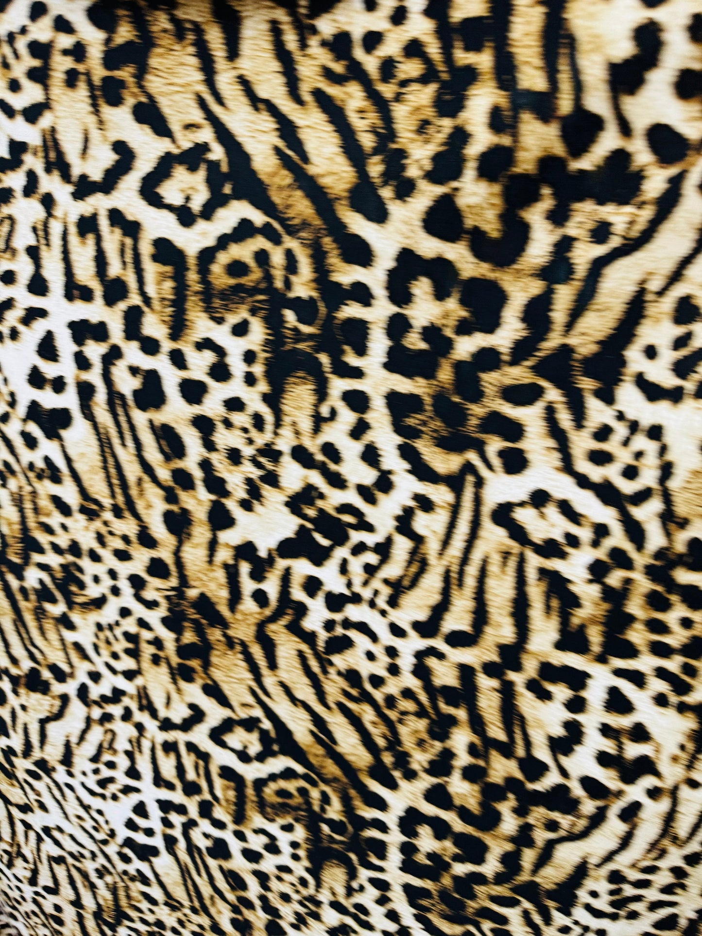 Wild Leopard design print on poly spandex medium weight 4-way stretch 58/60”