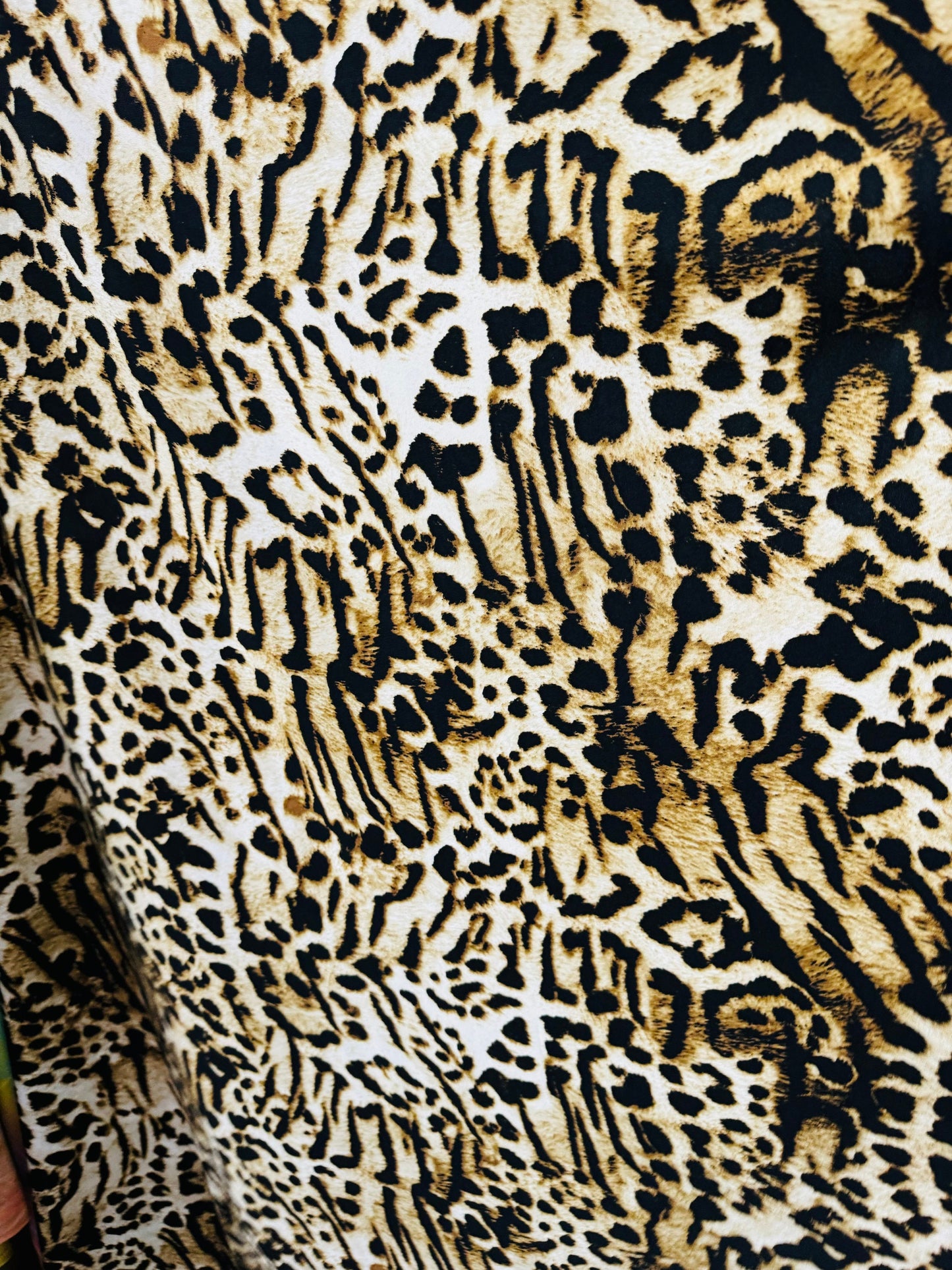 Wild Leopard design print on poly spandex medium weight 4-way stretch 58/60”