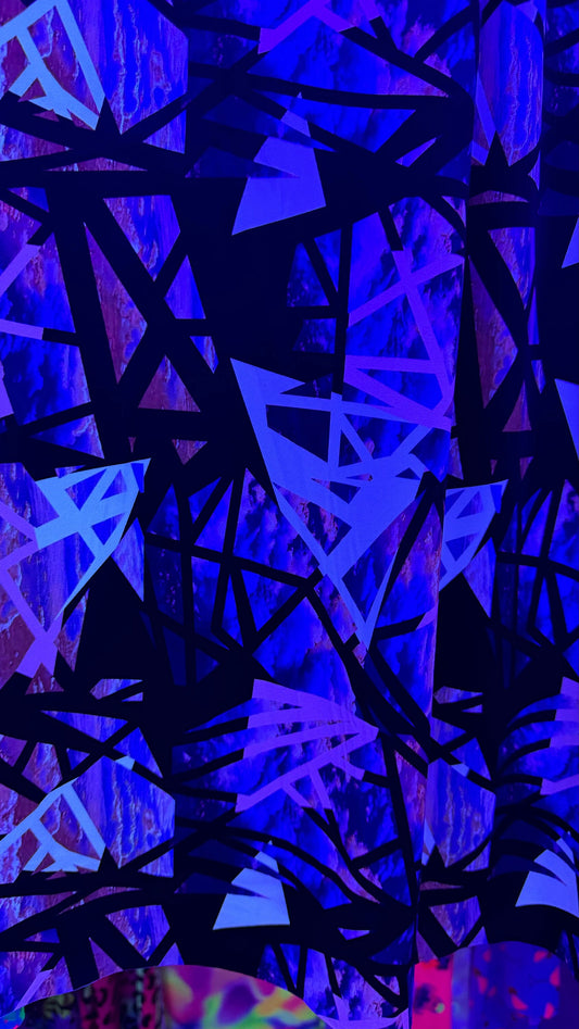 New abstract design it glows in the dark with a black light 4-way spandex 58/60” High quality fabrics by AlexLAFabrics