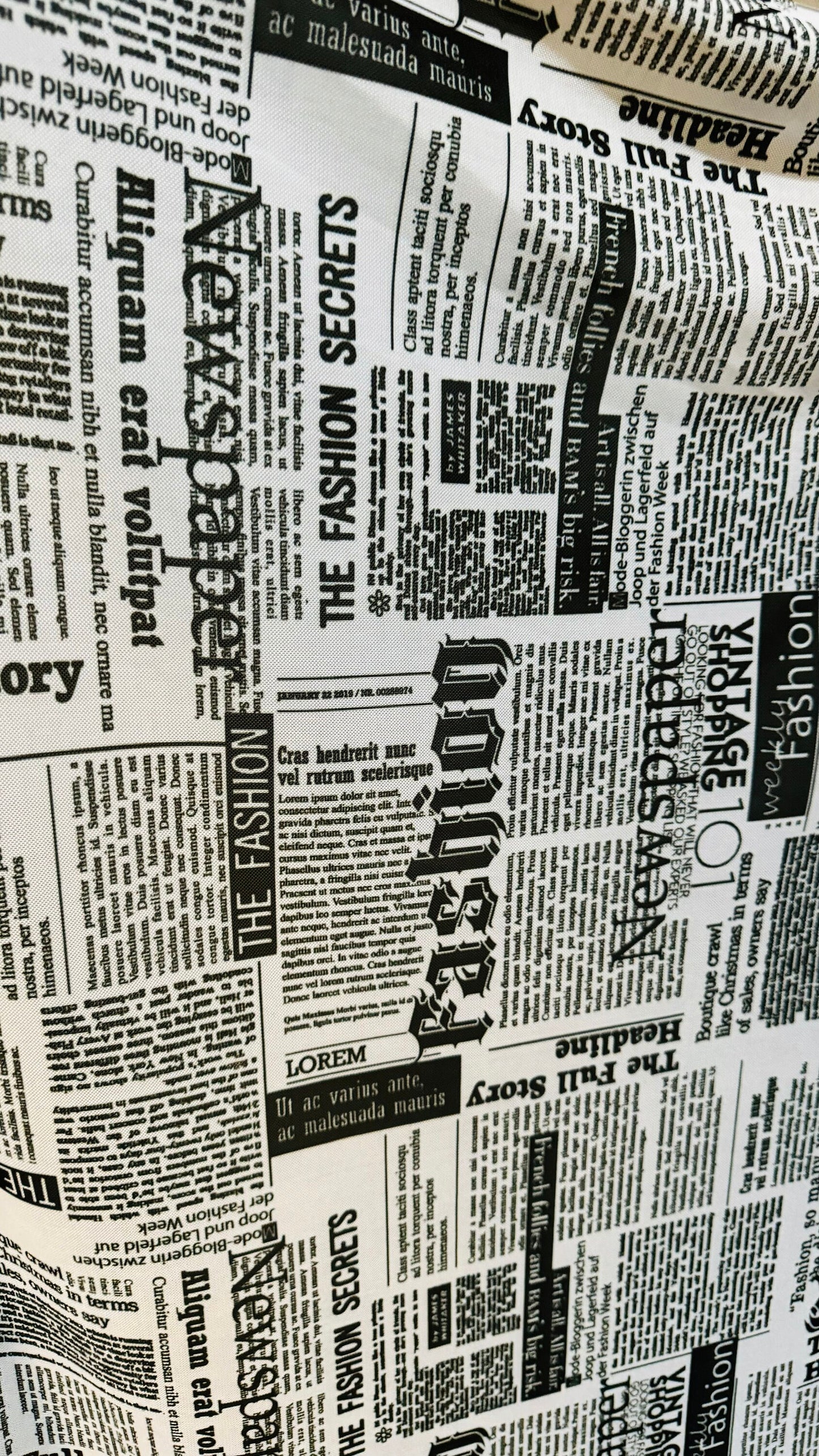 Newspaper design print on great quality of power mesh 4-way stretch 58/60”
