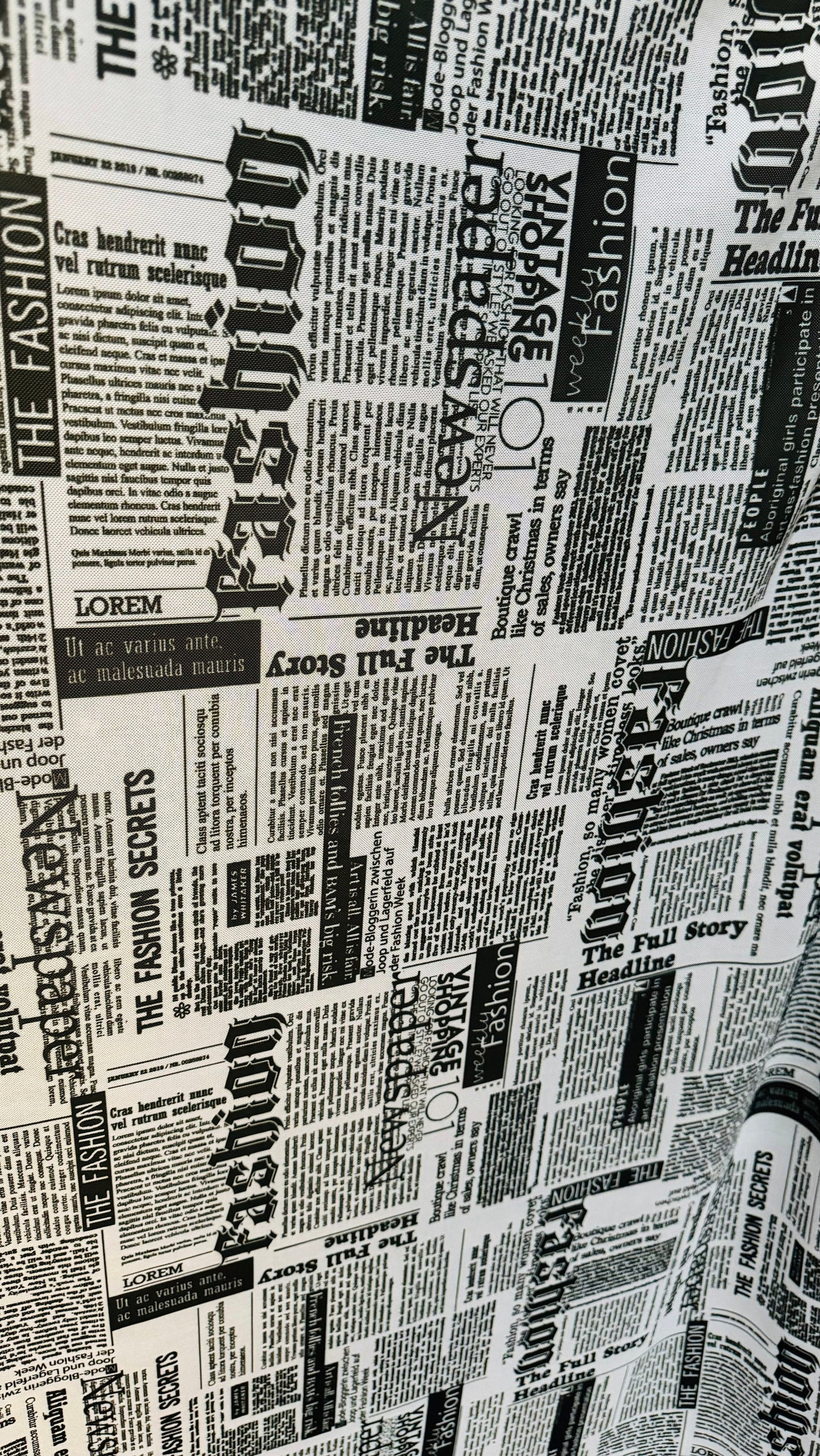 Newspaper design print on great quality of power mesh 4-way stretch 58/60”