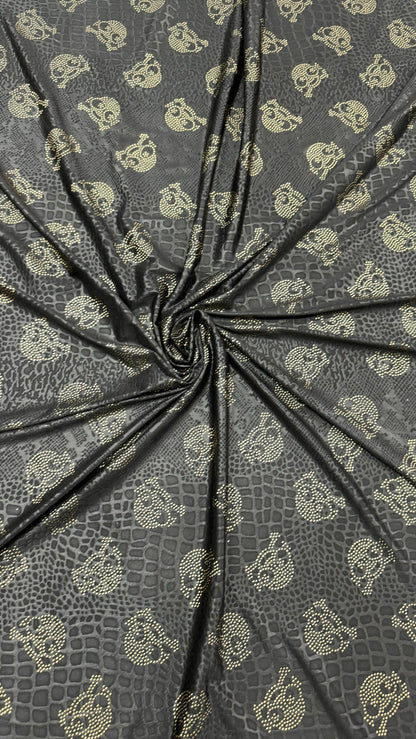 New skull design on embossed metallic poly spandex 2-way stretch 58/60” Sold by the YD. Ships worldwide from Los Angeles California USA