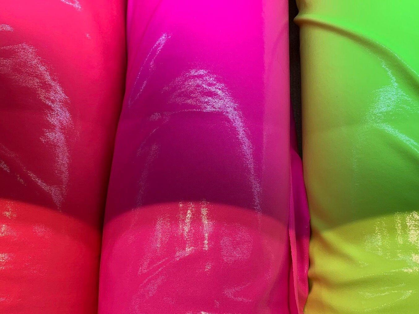 New neon colors foggy foil nylon spandex 4way stretch 58/60" Sold by the YD. Ships worldwide from Los Angeles California USA.
