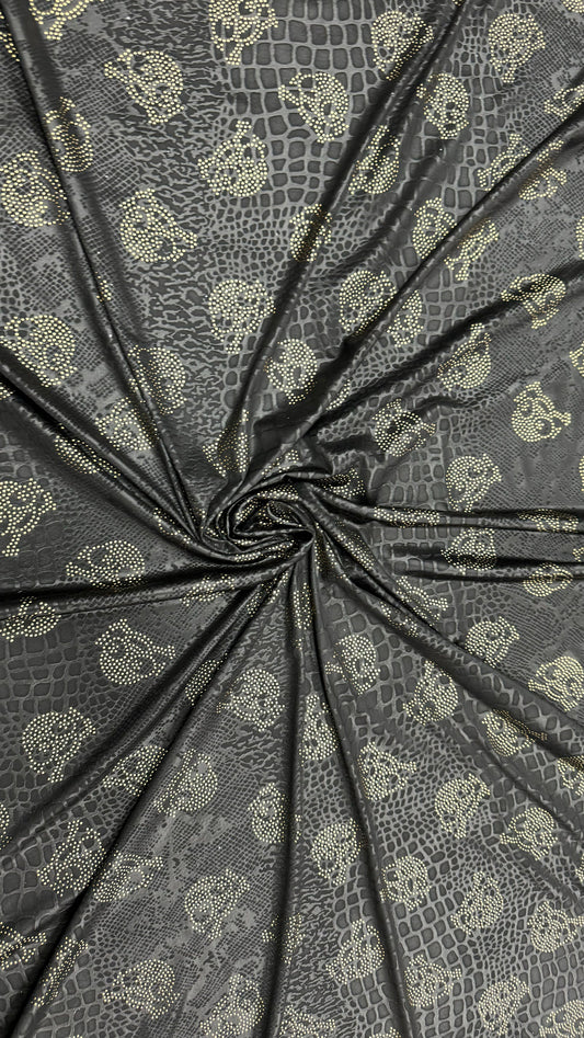 New skull design on embossed metallic poly spandex 2-way stretch 58/60” Sold by the YD. Ships worldwide from Los Angeles California USA