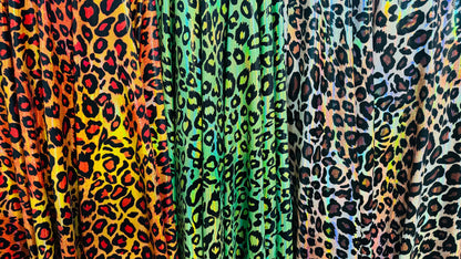 Wild Leopard design on Iridescent metallic nylon spandex with foggy foil 4-way stretch 58/60” High quality fabrics by AlexLAFabrics