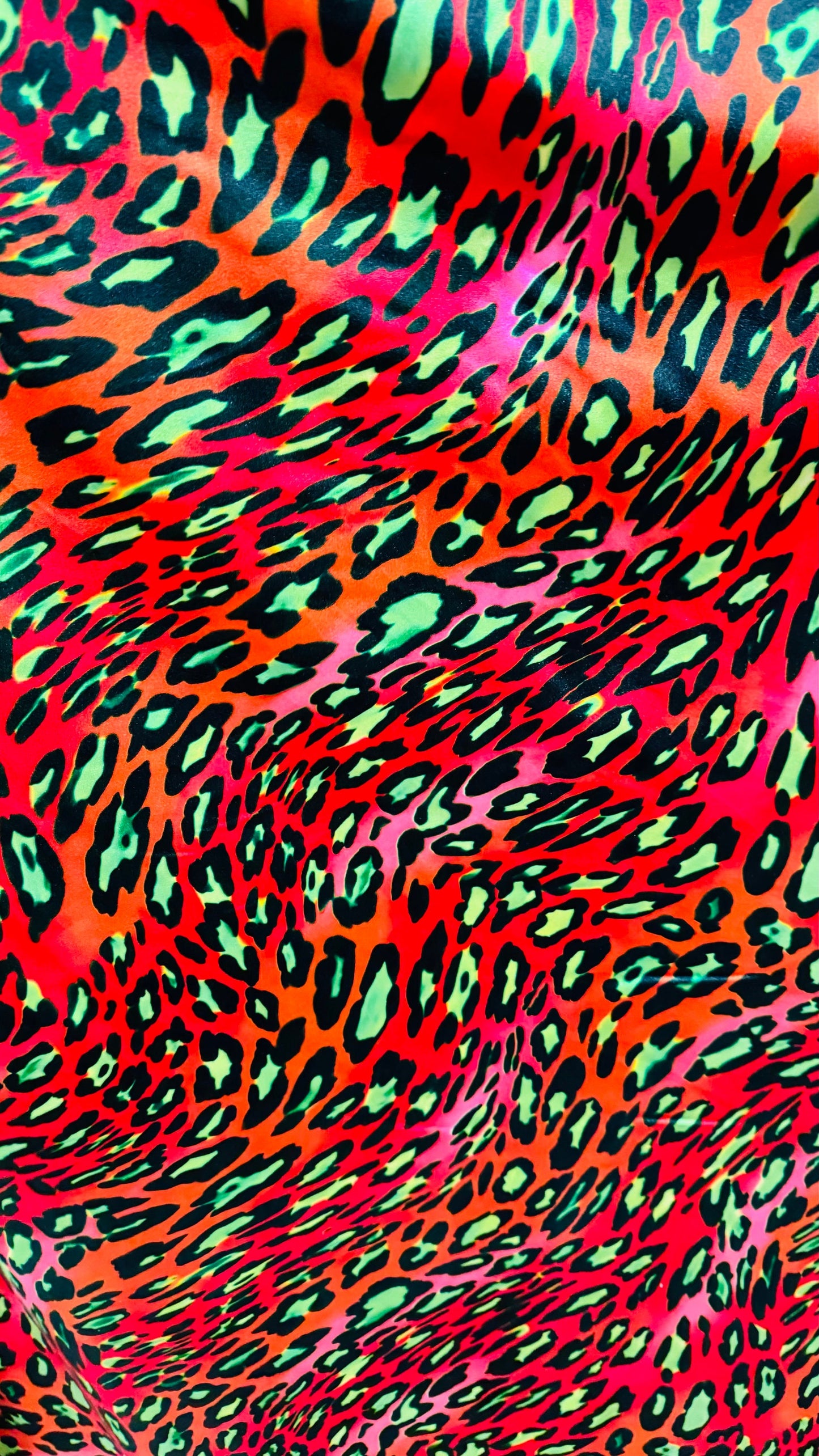 Leopard Exotic animal print with neon colors print on great quality of nylon spandex 4-way stretch 58/60” High quality fabrics by AlexLAFabr