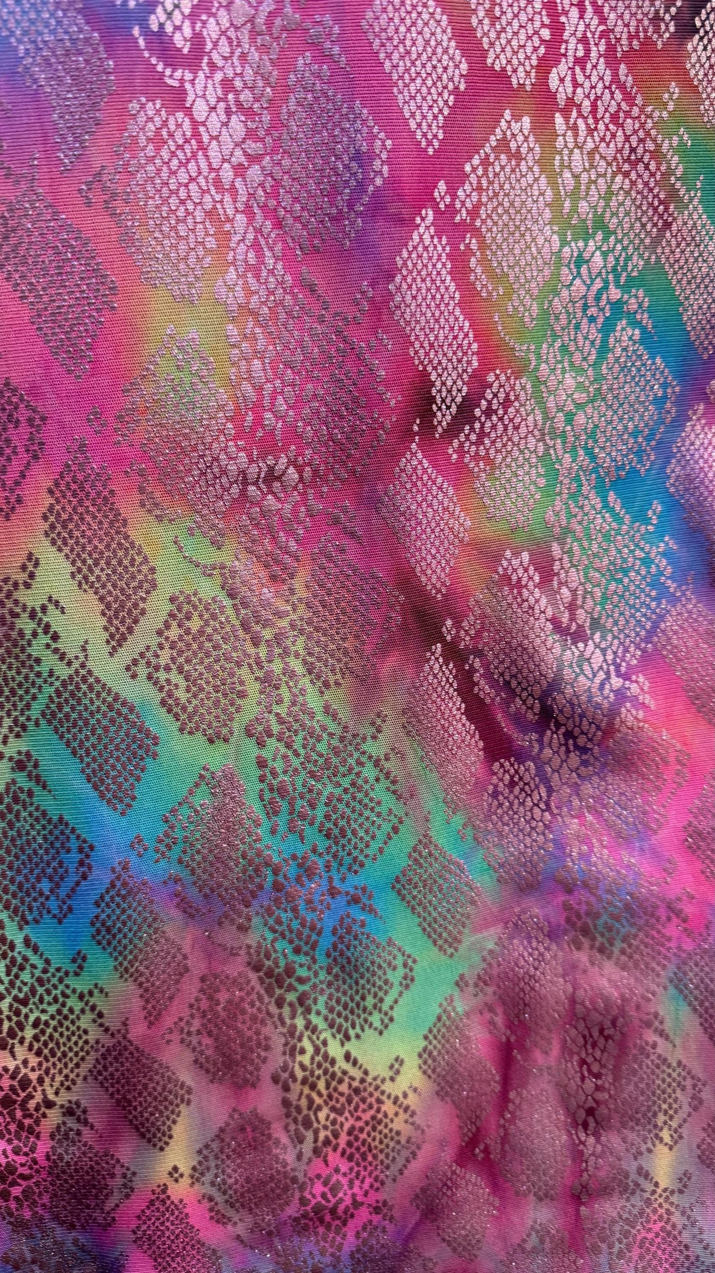 New exotic snake design print on tie dye metallic rainbow mesh 4-way stretch 58/60” Sold by the YD. Ships worldwide from Los Ángeles Ca