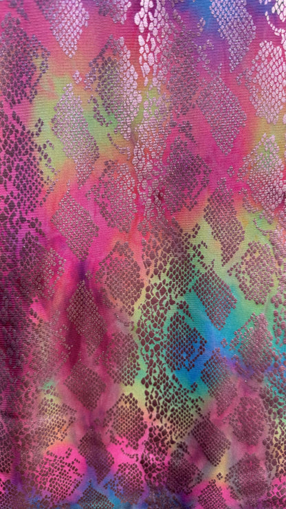 New exotic snake design print on tie dye metallic rainbow mesh 4-way stretch 58/60” Sold by the YD. Ships worldwide from Los Ángeles Ca