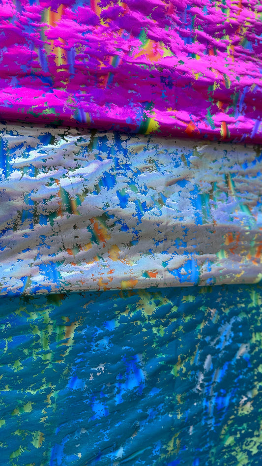 New splatter design metallic nylon spandex 4-way stretch 58/60” Sold by the YD. Ships worldwide from Los Angeles California USA.