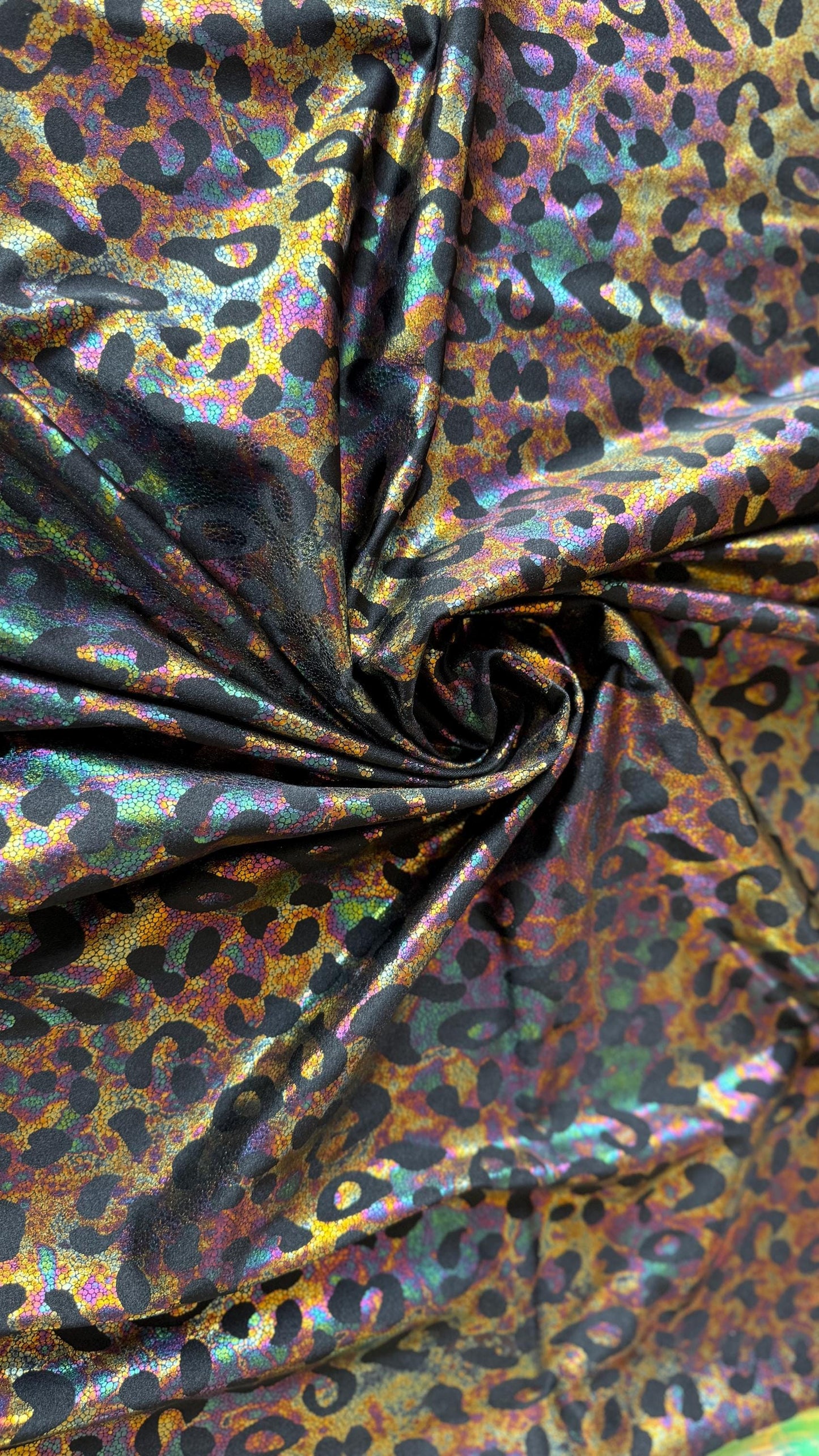 New exotic iridescent leopard design hologram nylon spandex 4-way stretch 58/60” Sold by the YD. Ships worldwide from Los Ángeles California