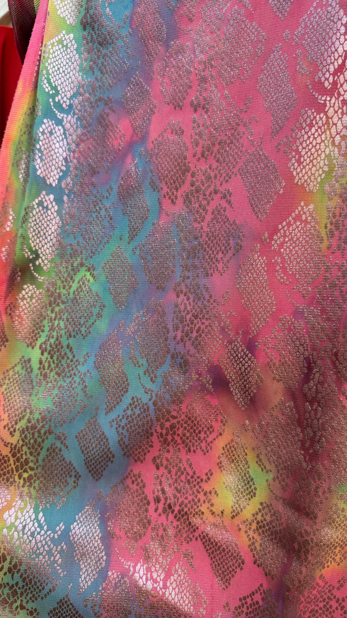 New exotic snake design print on tie dye metallic rainbow mesh 4-way stretch 58/60” Sold by the YD. Ships worldwide from Los Ángeles Ca