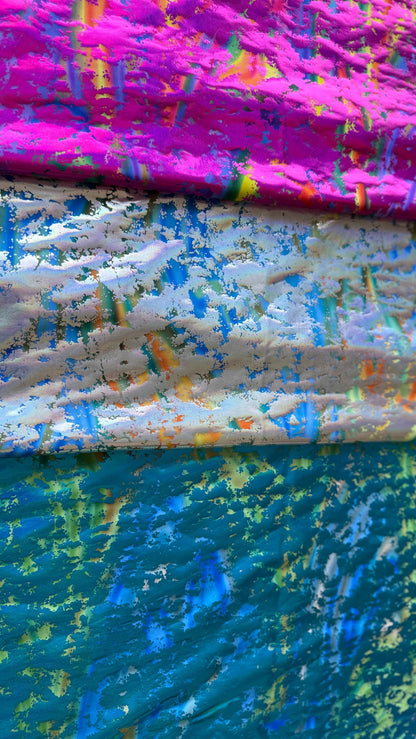 New splatter design metallic nylon spandex 4-way stretch 58/60” Sold by the YD. Ships worldwide from Los Angeles California USA.