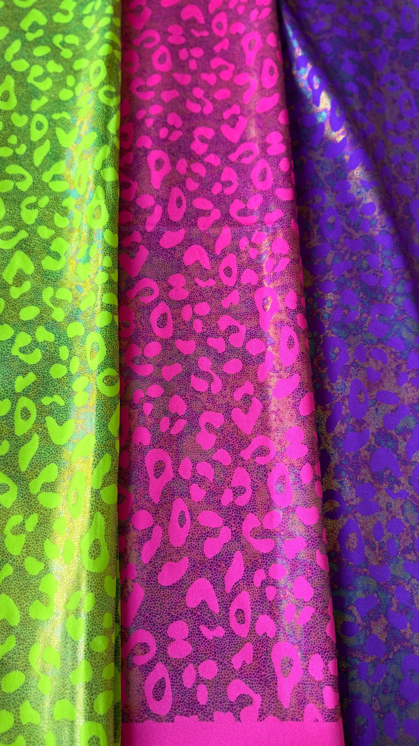 New exotic iridescent leopard design hologram nylon spandex 4-way stretch 58/60” Sold by the YD. Ships worldwide from Los Ángeles California