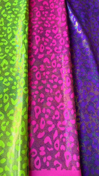 New exotic iridescent leopard design hologram nylon spandex 4-way stretch 58/60” Sold by the YD. Ships worldwide from Los Ángeles California