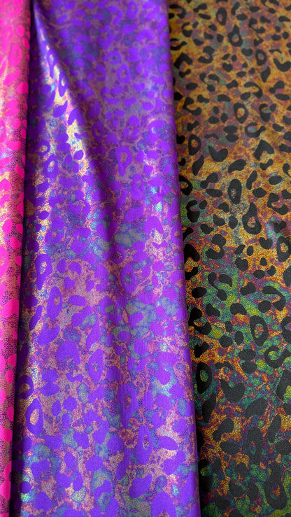 New exotic iridescent leopard design hologram nylon spandex 4-way stretch 58/60” Sold by the YD. Ships worldwide from Los Ángeles California