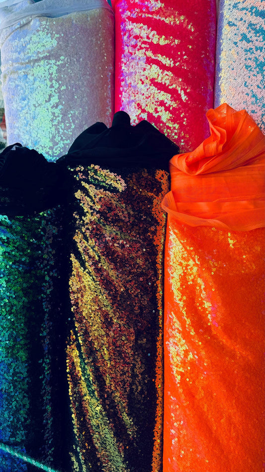 New neon colors iridescent mini sequins design embroidered on spandex mesh  2-way stretch 58/60” Sold by the YD. Ships Worldwide from L.A