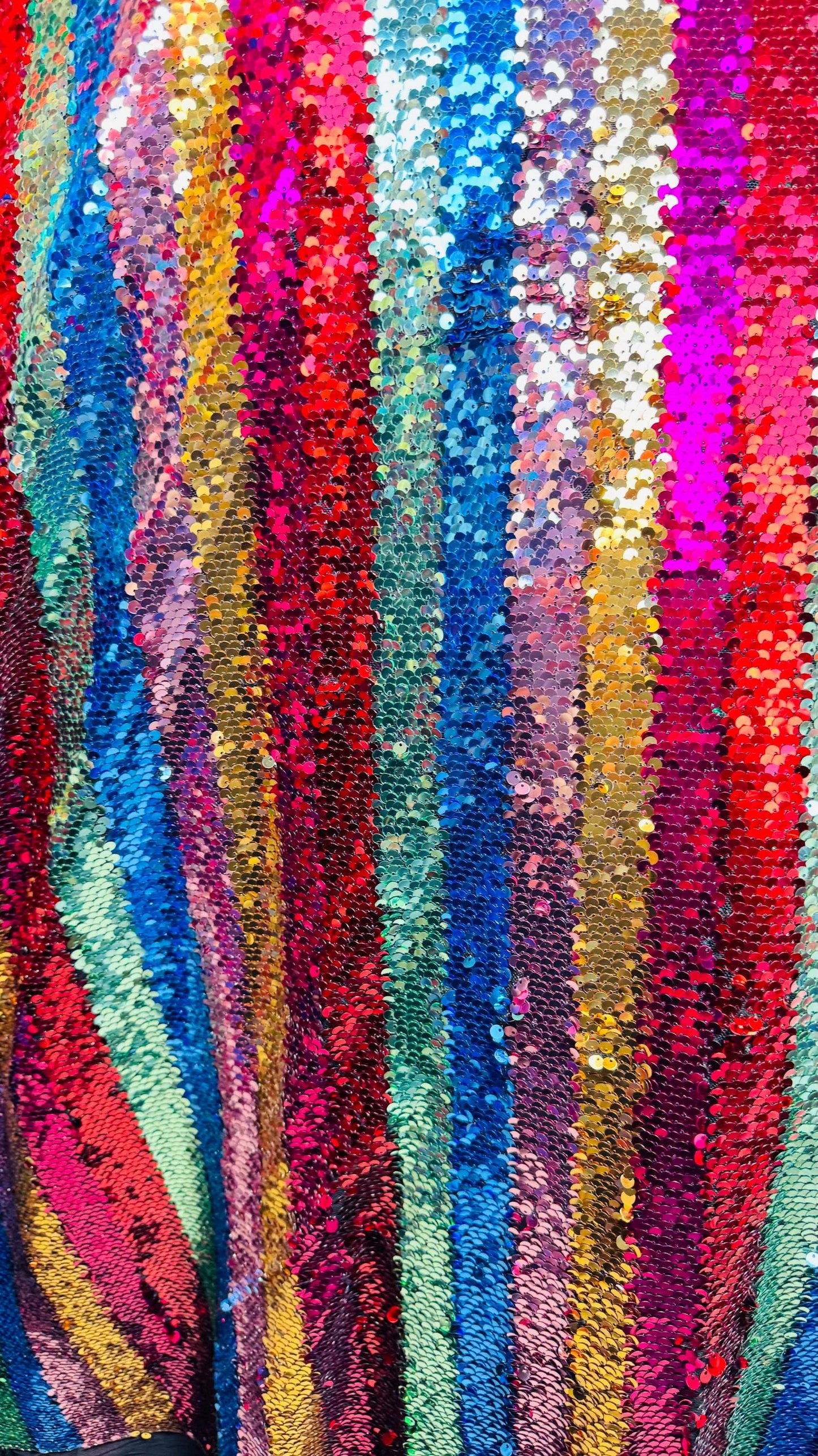 New Stripes design multicolor rainbow sequins on stretch mesh 4-way 55/57” Sold by the YD. Ships worldwide from Los Angeles California USA.