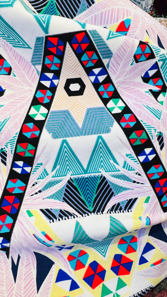 New tropical design multicolor print on nylon spandex 4-way stretch 58/60” Sold by the YD. Ships worldwide from Los Angeles California USA.