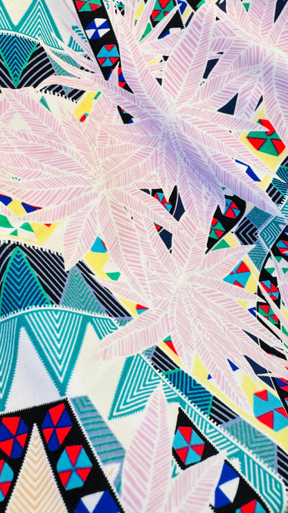 New tropical design multicolor print on nylon spandex 4-way stretch 58/60” Sold by the YD. Ships worldwide from Los Angeles California USA.