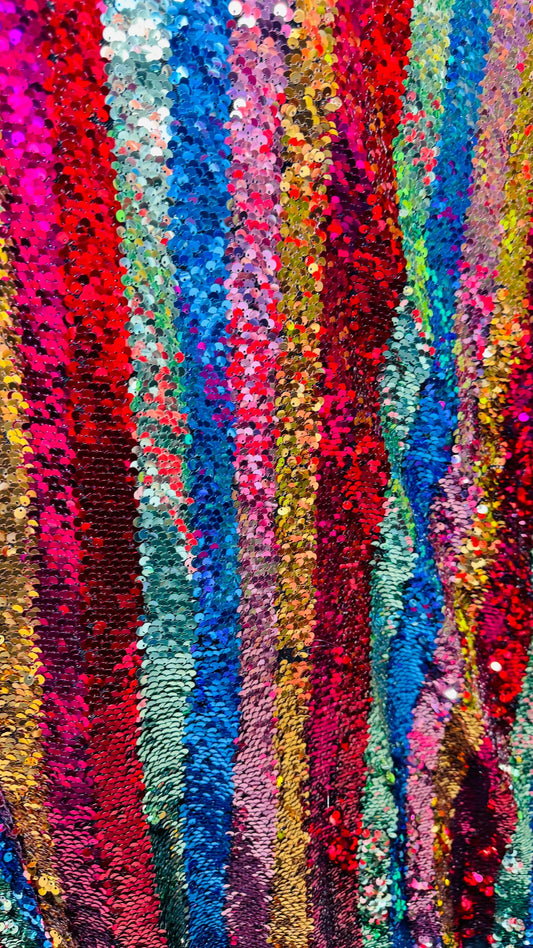 New Stripes design multicolor rainbow sequins on stretch mesh 4-way 55/57” Sold by the YD. Ships worldwide from Los Angeles California USA.