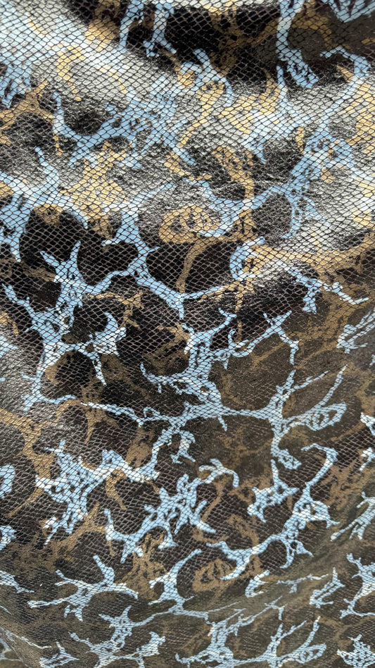 New Abstract design with skin snake foil  on stretch velvet 2-way 58/60”  Sold by the YD. Ships worldwide from Los Angeles California USA.