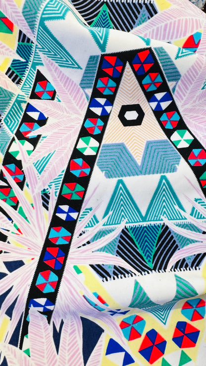 New tropical design multicolor print on nylon spandex 4-way stretch 58/60” Sold by the YD. Ships worldwide from Los Angeles California USA.