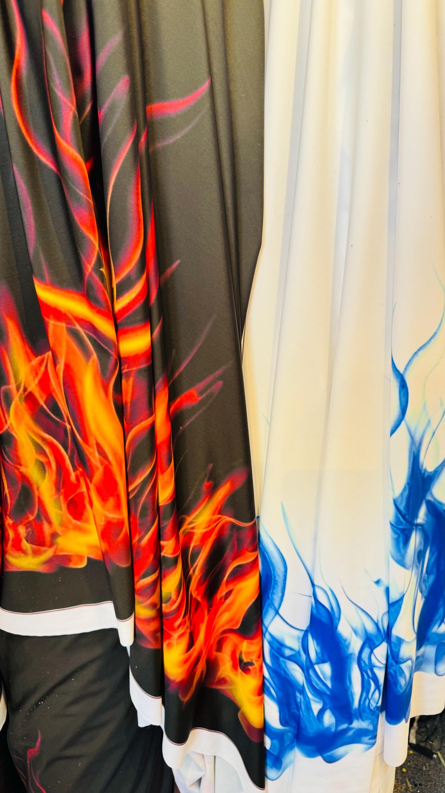 Flames design Black/Fire and White/Sapphire print on great quality of nylon spandex 4-way stretch 58/60” Sold by the YD. Ships Worldwide