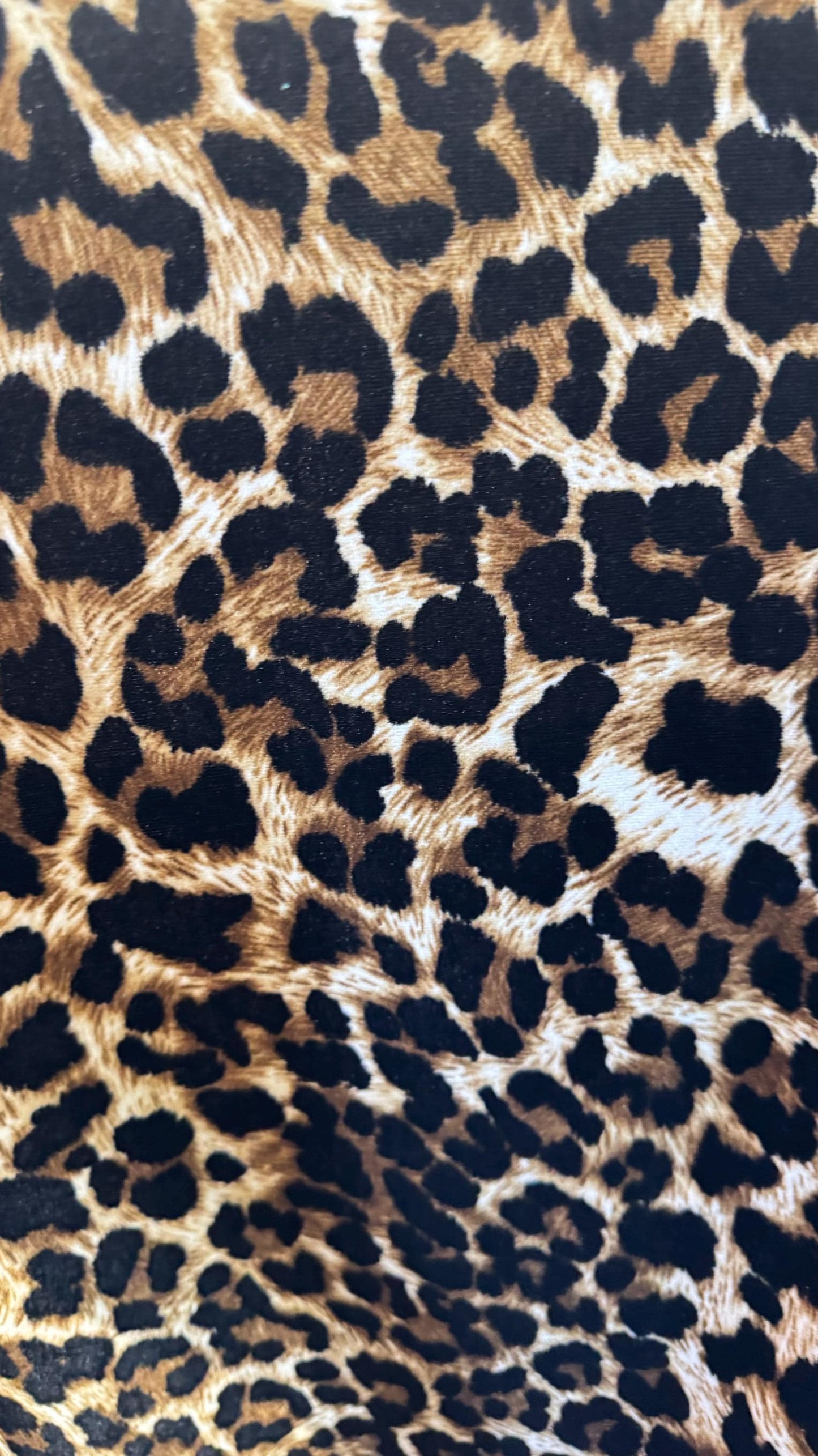 Cheetah Exotic design print on good quality stretch velvet 4way 58/60" Sold by the YD. Ships worldwide from Los Angeles California USA.