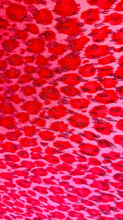 Leopard design Red/Pink  with glitter print on velvet 420gsm 4way stretch 58/60” Sold by the YD. Ships worldwide from Los Angeles California