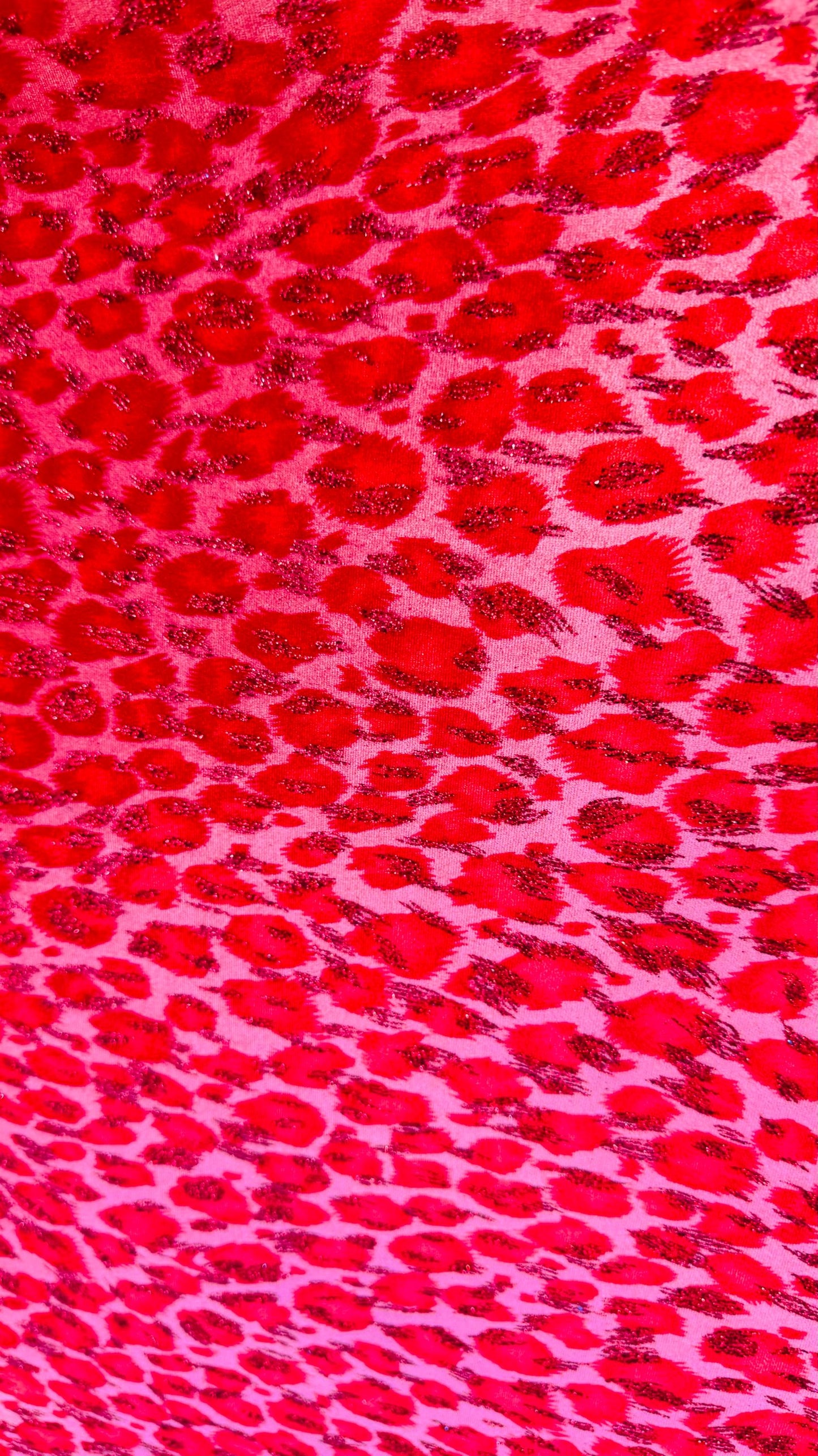 Leopard design Red/Pink  with glitter print on velvet 420gsm 4way stretch 58/60” Sold by the YD. Ships worldwide from Los Angeles California