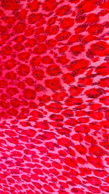 Leopard design Red/Pink  with glitter print on velvet 420gsm 4way stretch 58/60” Sold by the YD. Ships worldwide from Los Angeles California
