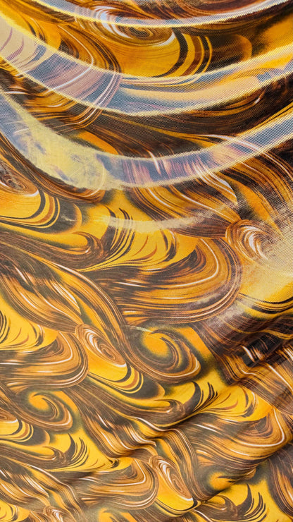 New tornado abstract design on poly spandex with super shiny foil  4way stretch 58/60" Sold by the YD. Ships worldwide from Los Angeles Ca