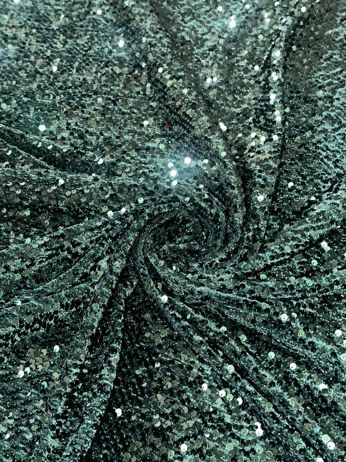 New stretch velvet with luxury sequins Hunter Green all over 5mm shining sequins 2-way stretch 58/60” Sold by the YD. Ships worldwide