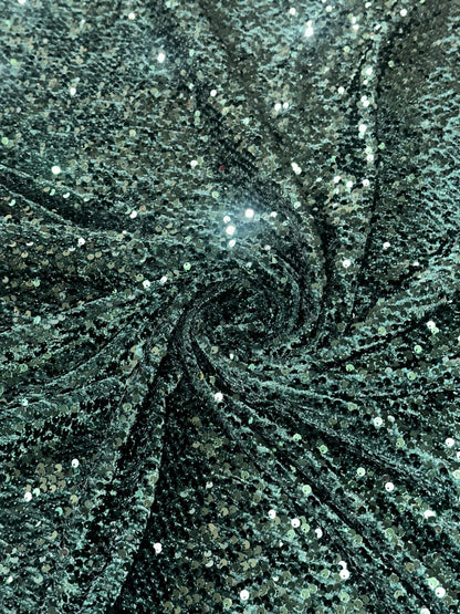 New stretch velvet with luxury sequins Hunter Green all over 5mm shining sequins 2-way stretch 58/60” Sold by the YD. Ships worldwide