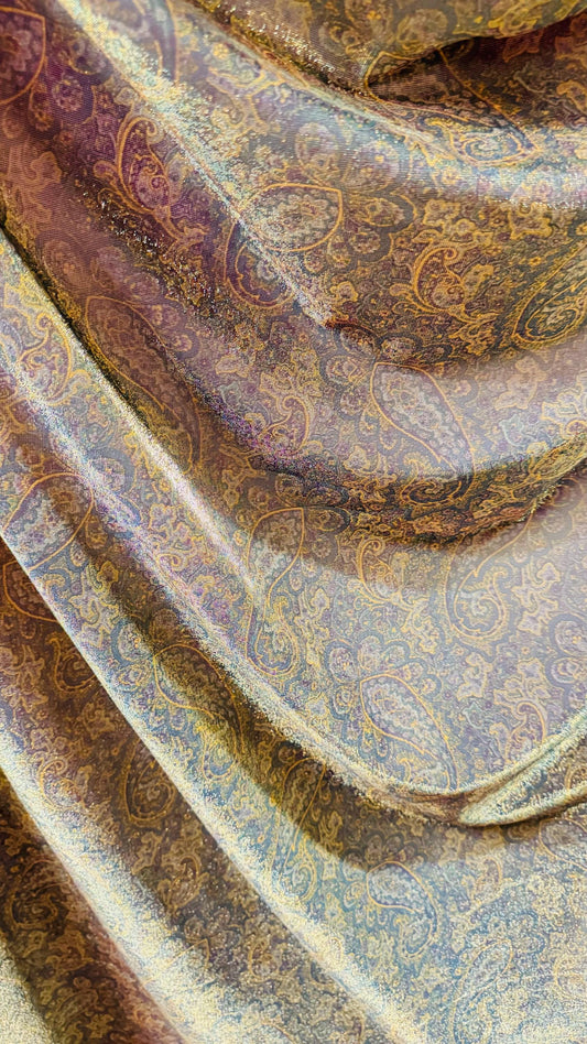 New metallic iridescent paisley mesh Gold/Multicolor  2-way stretch 58/60" Sold by the YD. Ships worldwide from Los Ángeles California USA.