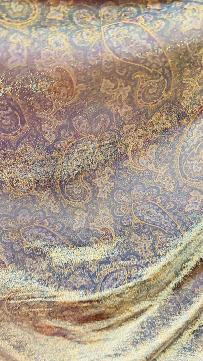 New metallic iridescent paisley mesh Gold/Multicolor  2-way stretch 58/60" Sold by the YD. Ships worldwide from Los Ángeles California USA.