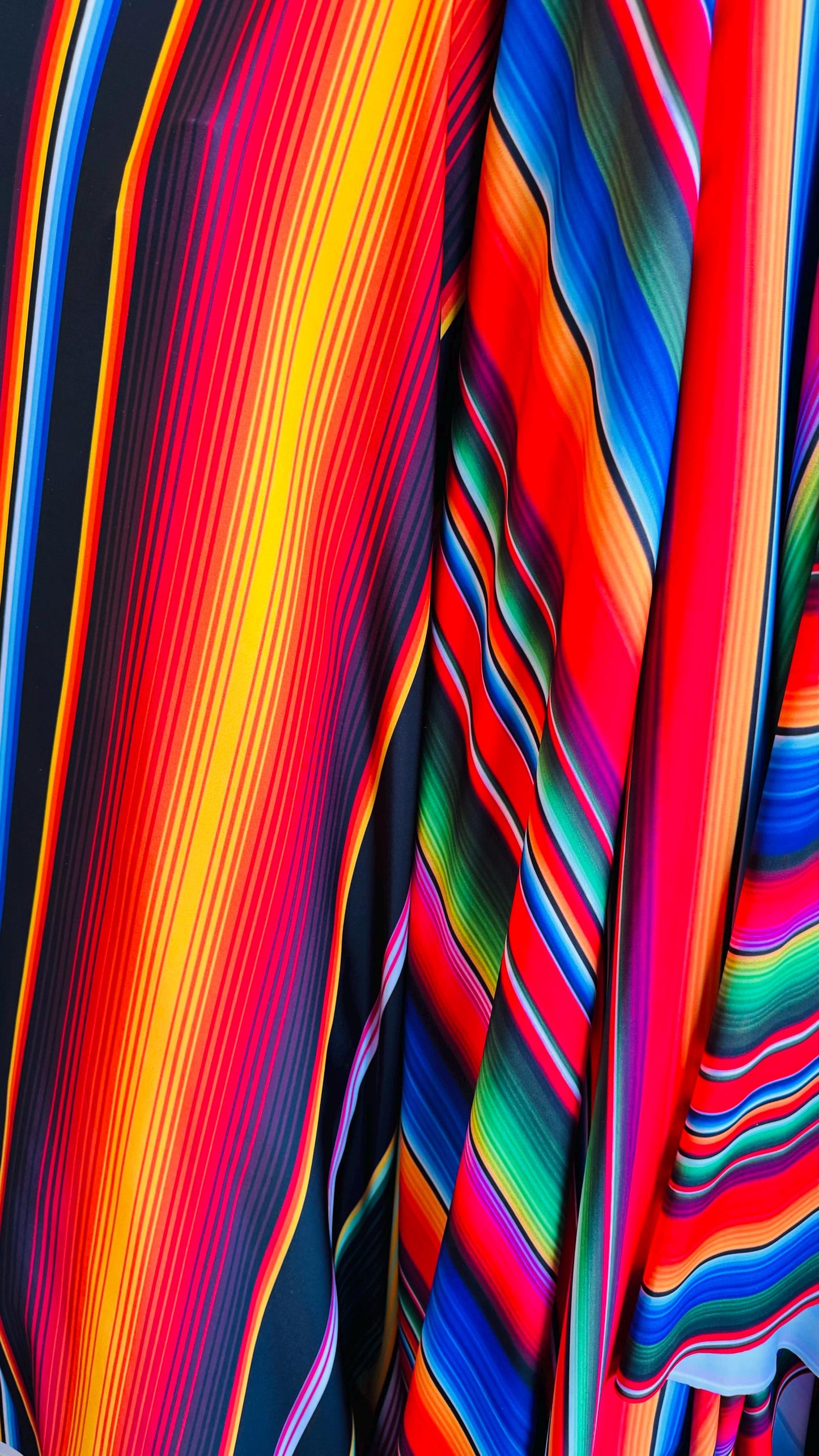 Zarape design colorful striped multicolor print on great quality of nylon spandex 4-way stretch 58/60” Sold by the YD.