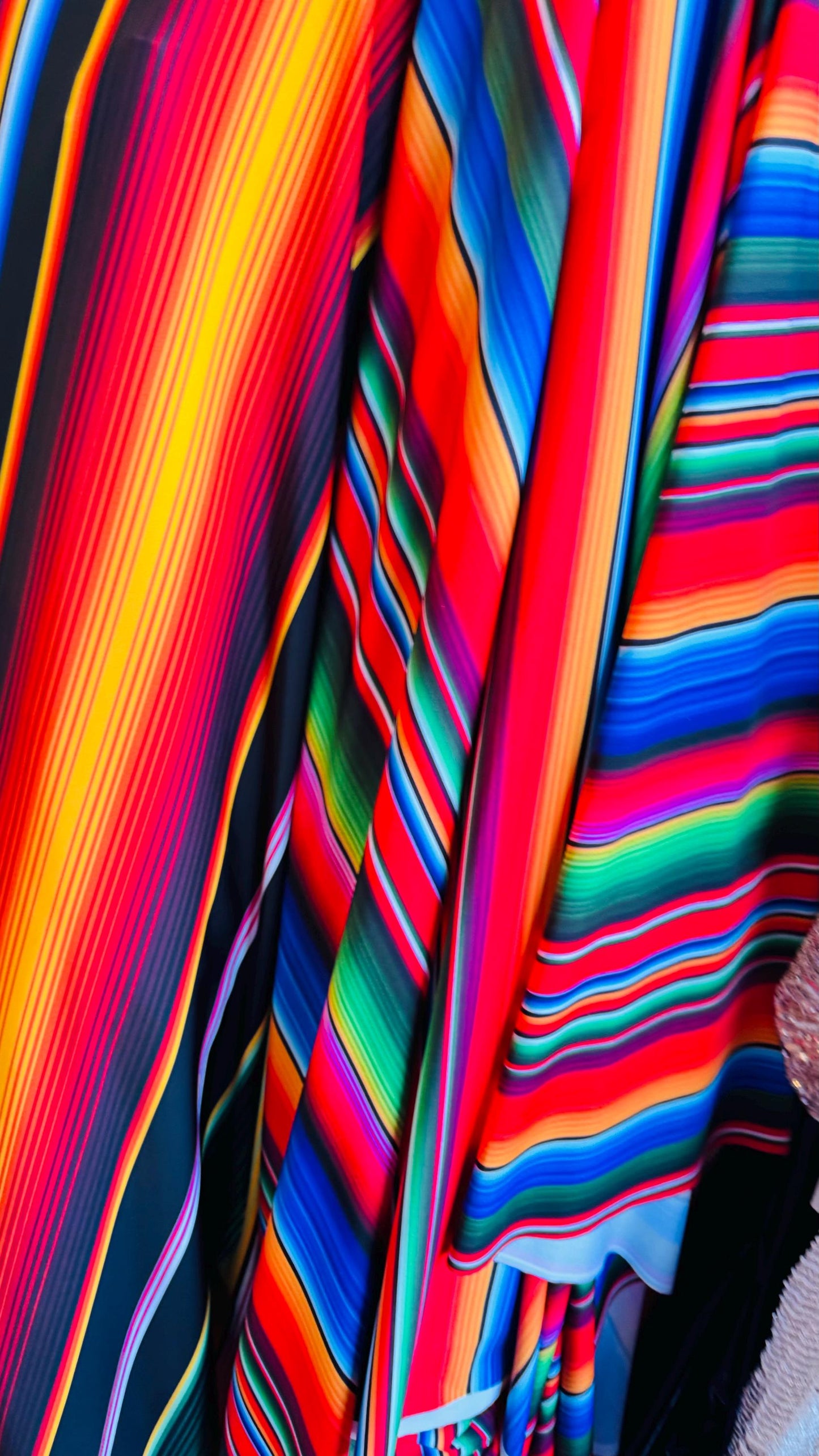 Zarape design colorful striped multicolor print on great quality of nylon spandex 4-way stretch 58/60” Sold by the YD.