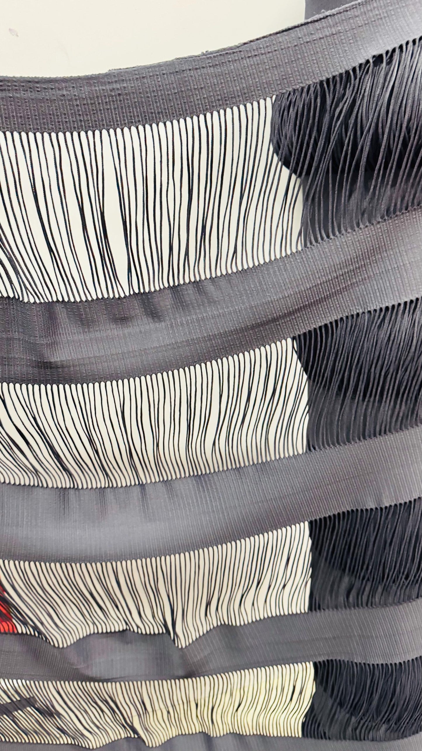 Spandex Fringe design nylon spandex 4-way stretch 55/57” Sold by the YD. Ships worldwide from Los Angeles California USA.