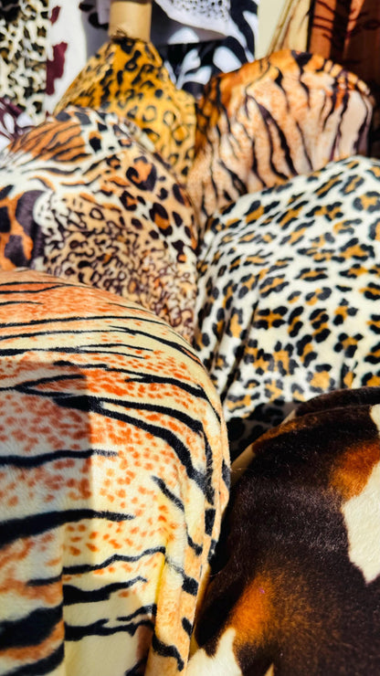 Exotic animal prints on Luxury Balboa non stretch velvet 58/60" Sold by the YD. Ships worldwide from Los Angeles California USA.