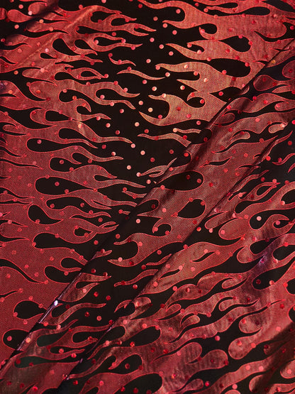 Flames design Hologram Red/Black poly spandex 4 way stretch 58/60" Sold by the YD. Ships worldwide from Los Angeles California USA