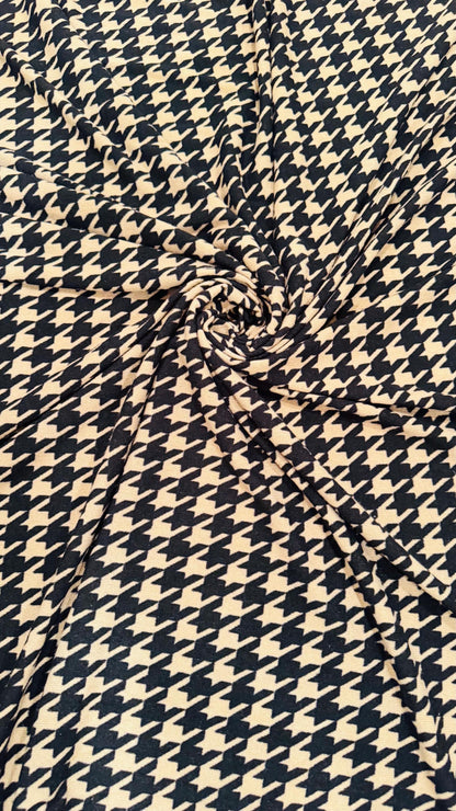 New Modern brand Houndstooth design print on sweater knit 2-way stretch 58/60” Sold by the YD. Ships worldwide from Los Angeles California