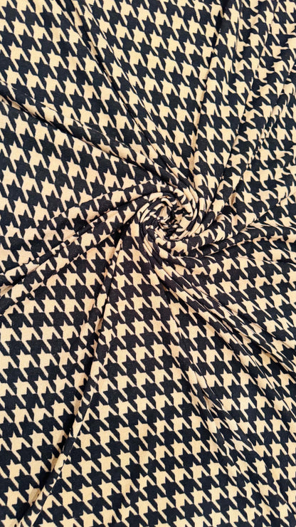 New Modern brand Houndstooth design print on sweater knit 2-way stretch 58/60” Sold by the YD. Ships worldwide from Los Angeles California
