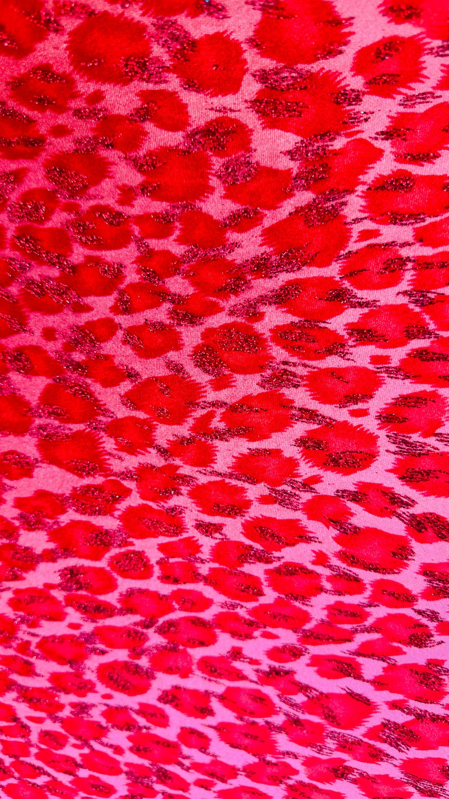 Leopard design Red/Pink  with glitter print on velvet 420gsm 4way stretch 58/60” Sold by the YD. Ships worldwide from Los Angeles California