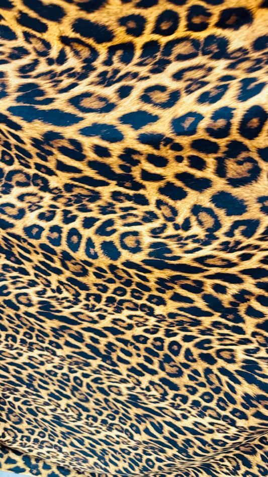 New leopard print Brown/Gold on brush poly spandex 4way stretch 58/60" Sold by the YD. Ships worldwide from Los Ángeles California USA.