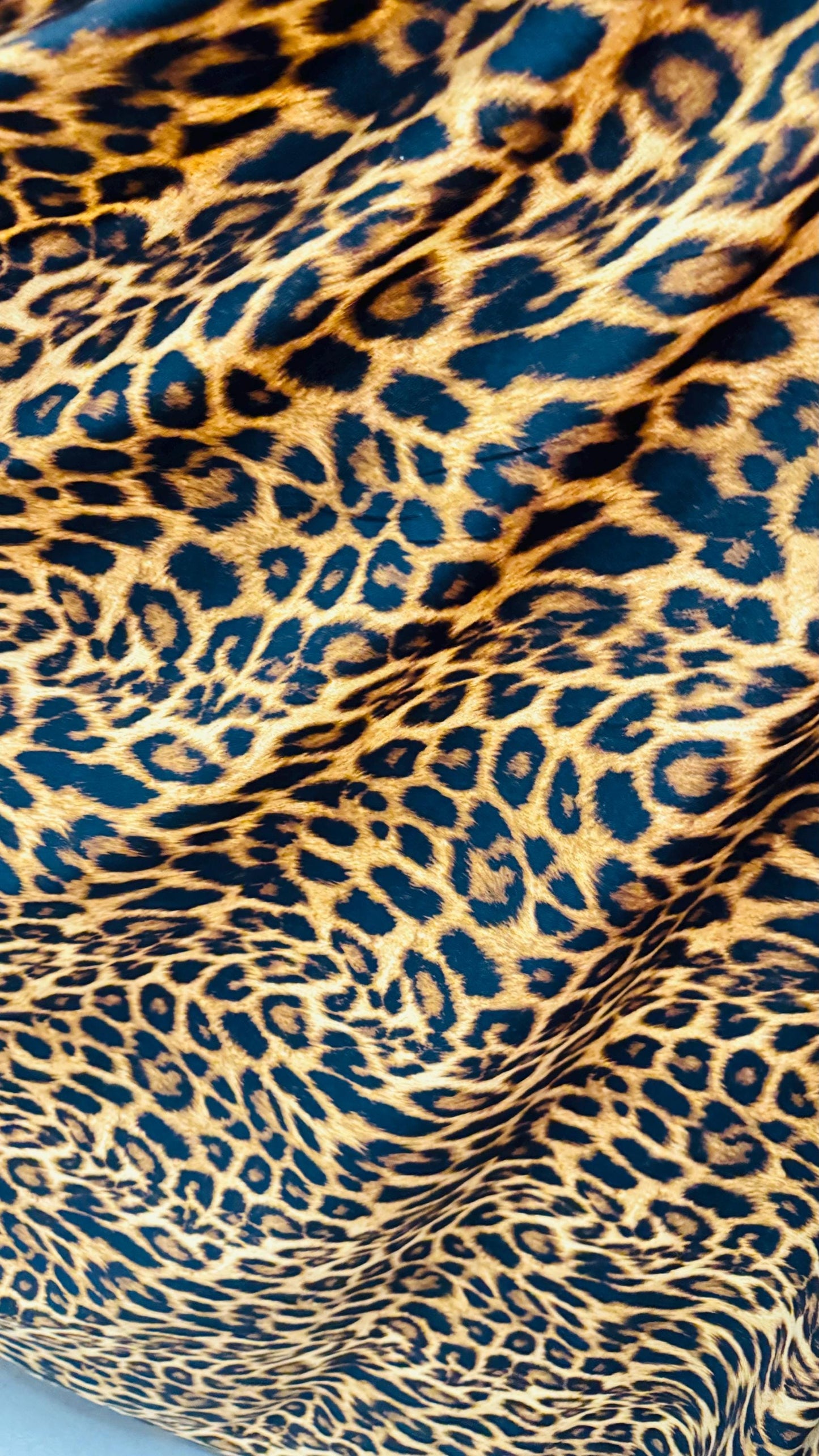 New leopard print Brown/Gold on brush poly spandex 4way stretch 58/60" Sold by the YD. Ships worldwide from Los Ángeles California USA.