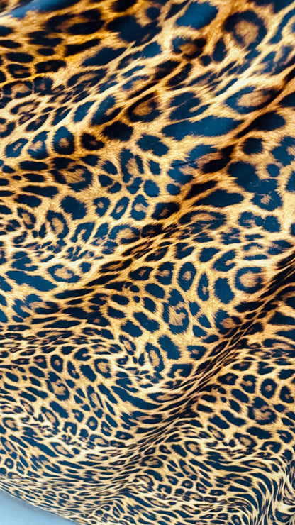 New leopard print Brown/Gold on brush poly spandex 4way stretch 58/60" Sold by the YD. Ships worldwide from Los Ángeles California USA.